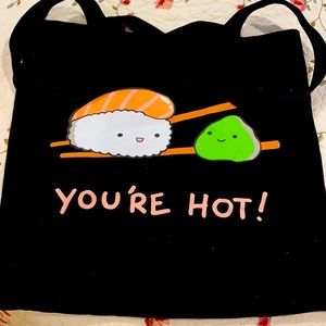 Black bag with sushi on it